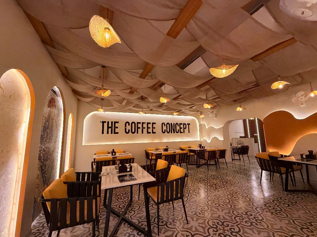 Cream drapes and TCC signage