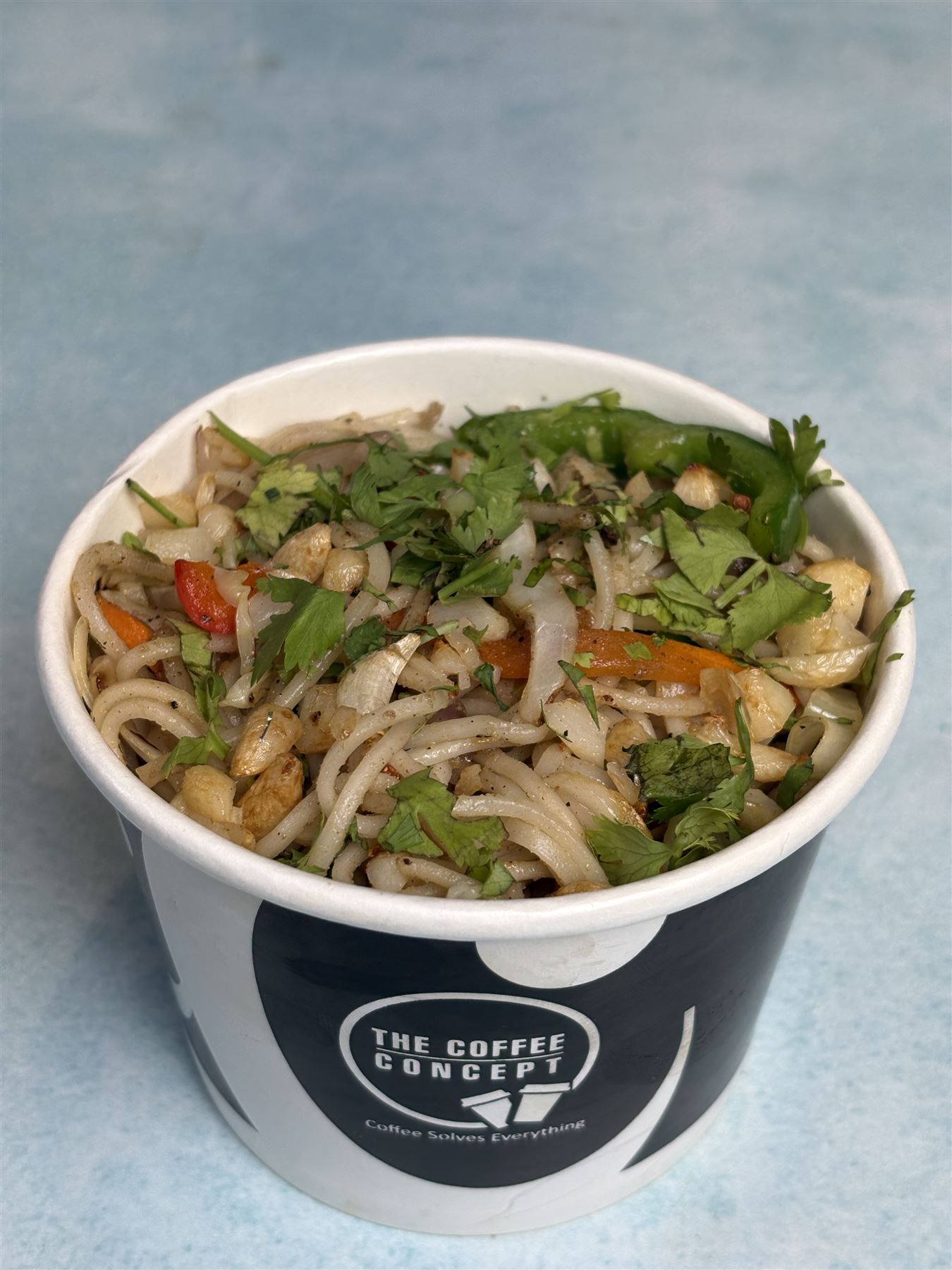 Hakka noodles in a TCC bowl