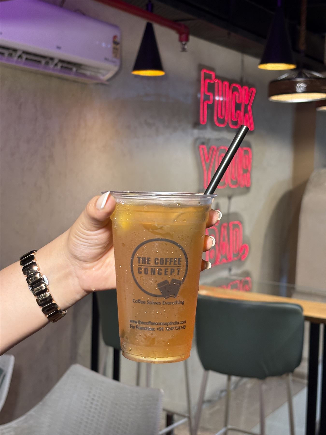 Iced tea under the neon sign